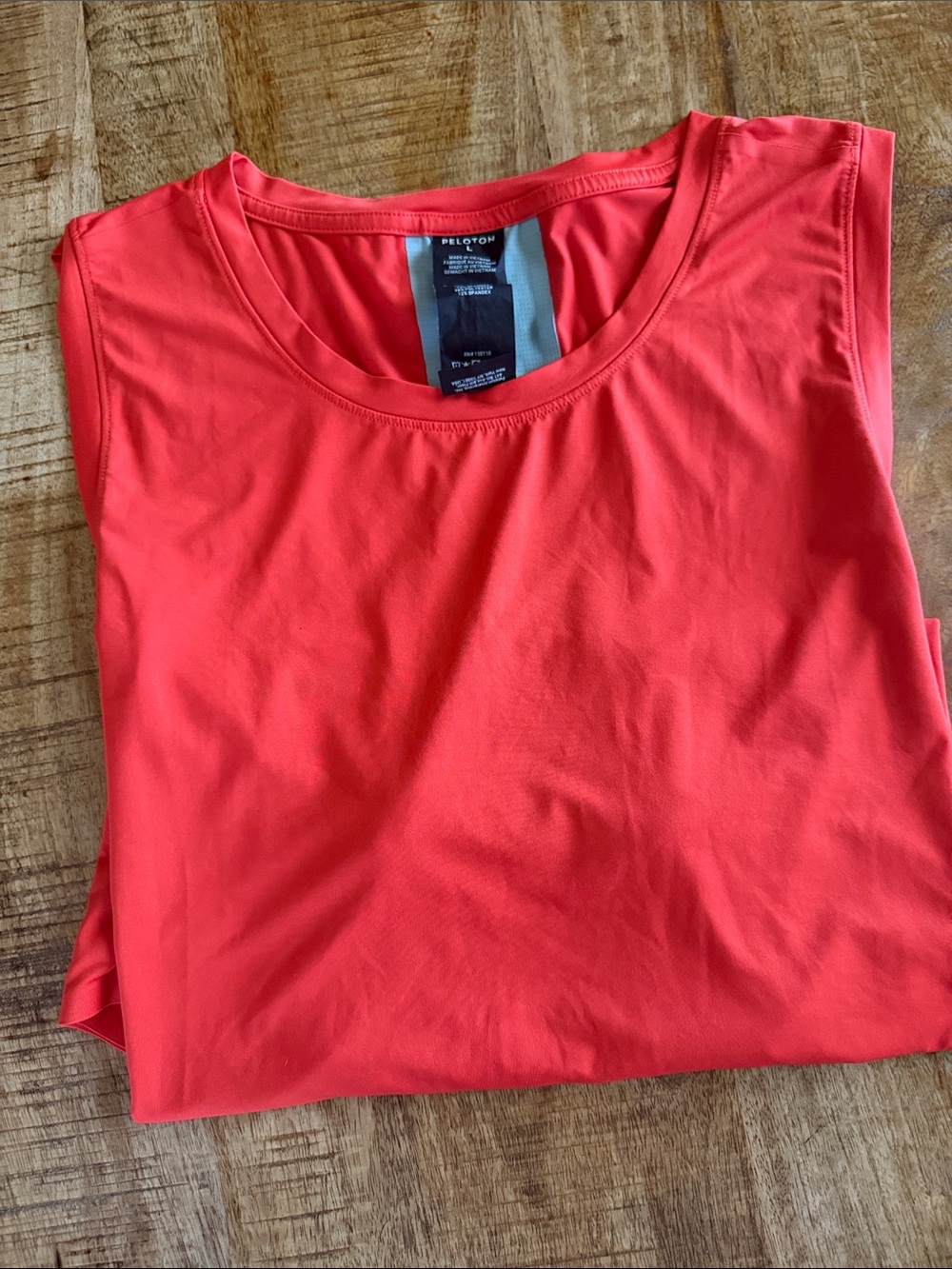 Peloton Coral-Orange Sleeveless Training Tank